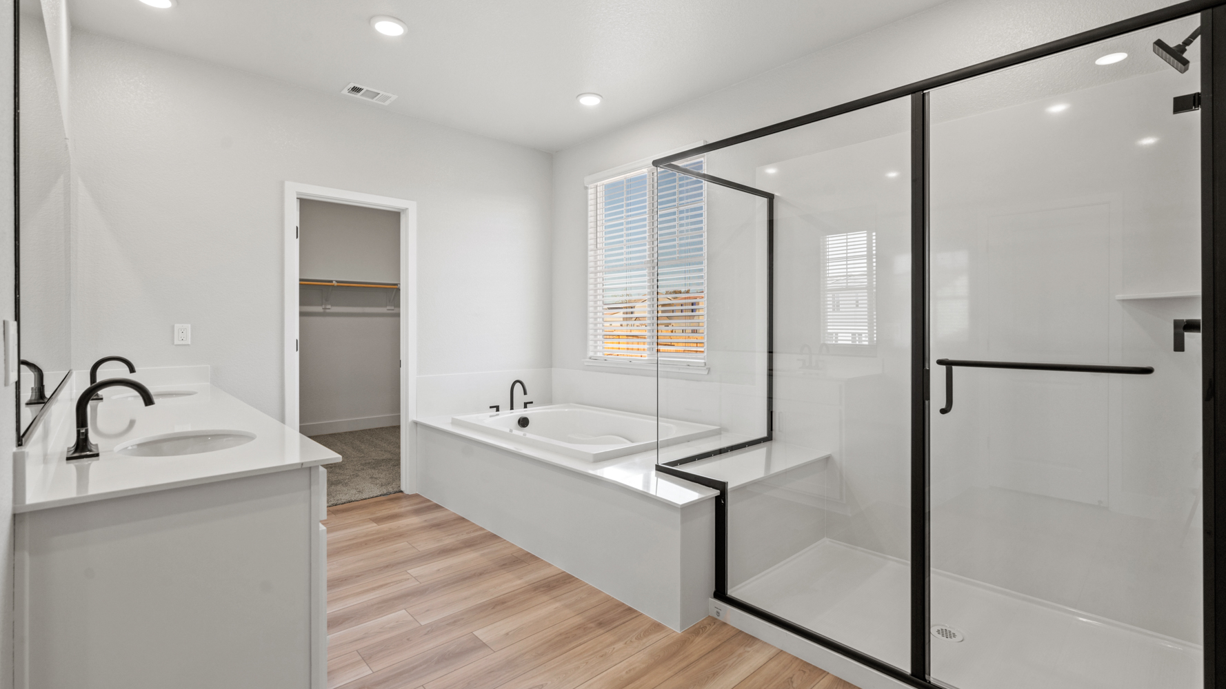 A bathroom with a glass shower.