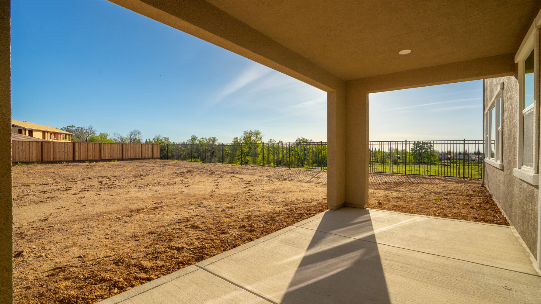 A building with a fence and a gate.