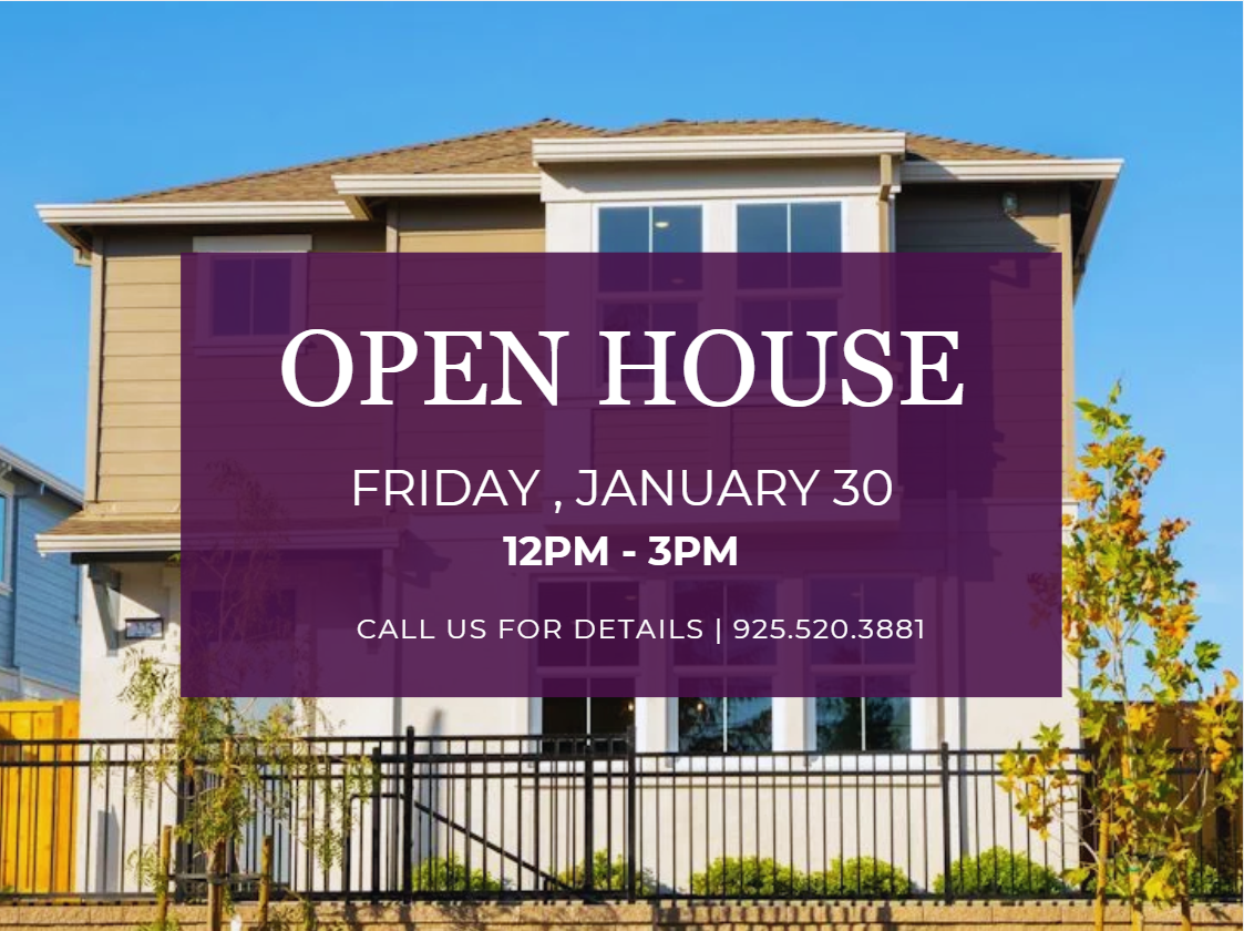 A large purple building with a white fence in front of it.