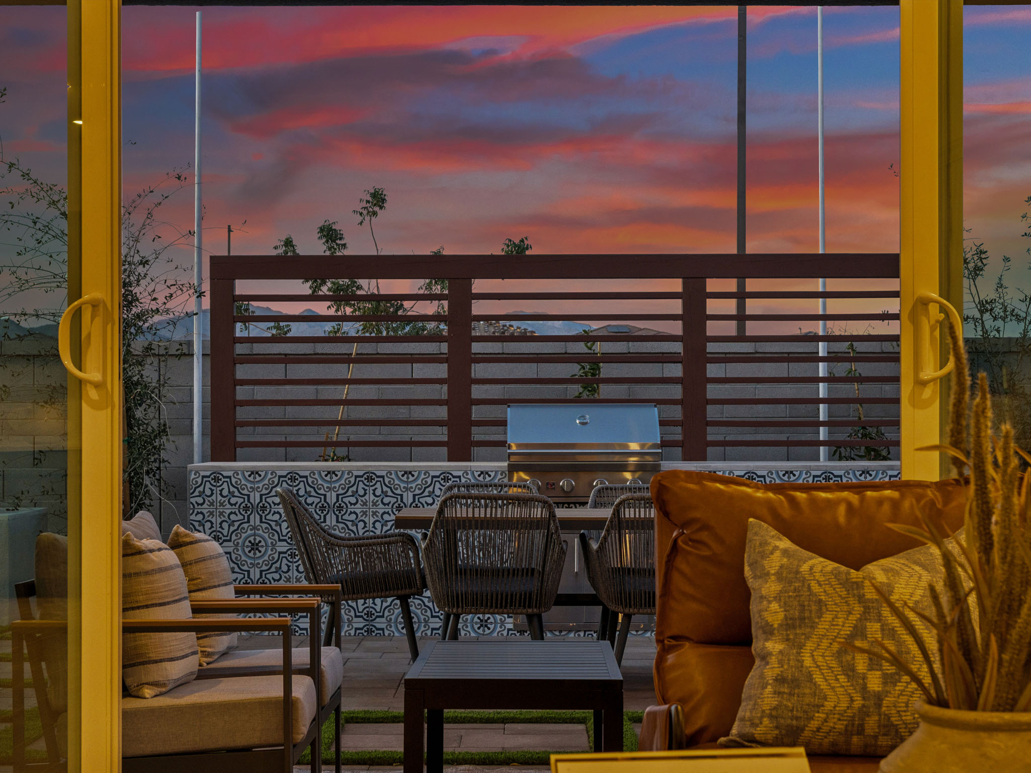 A room with a table and chairs.