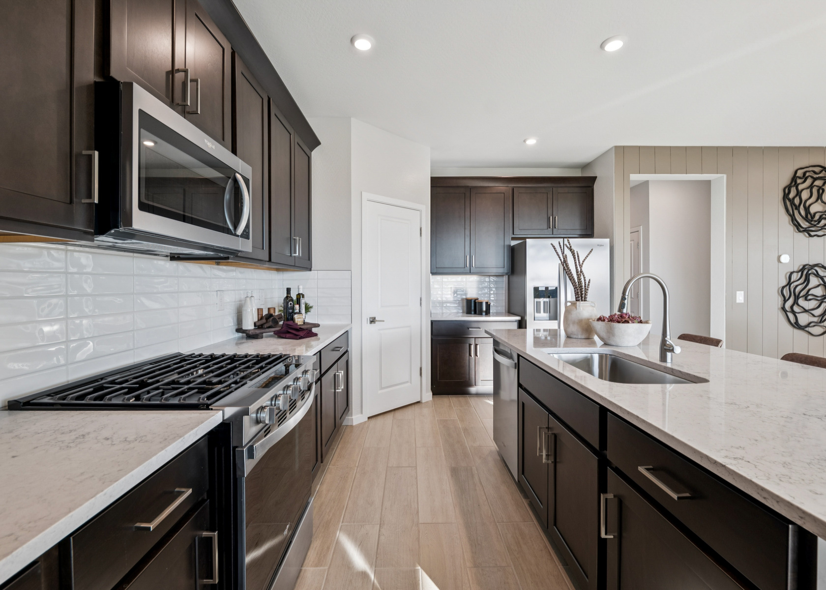 A kitchen with black appliances.
