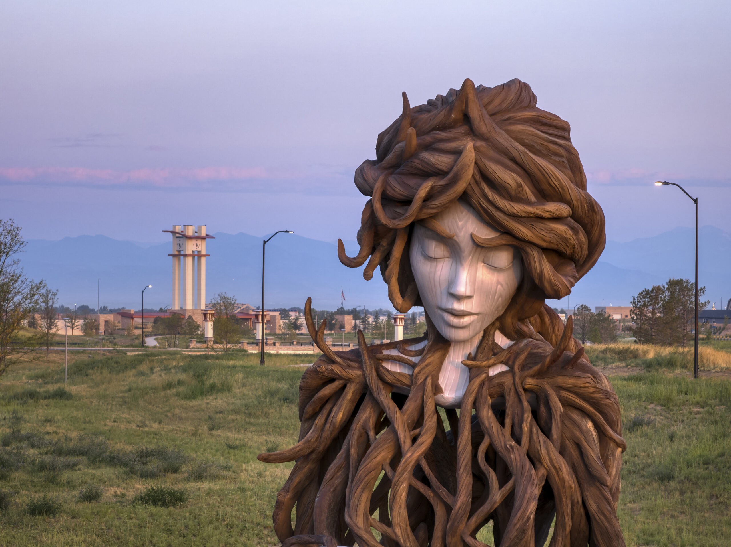 A statue of a person with a large head.