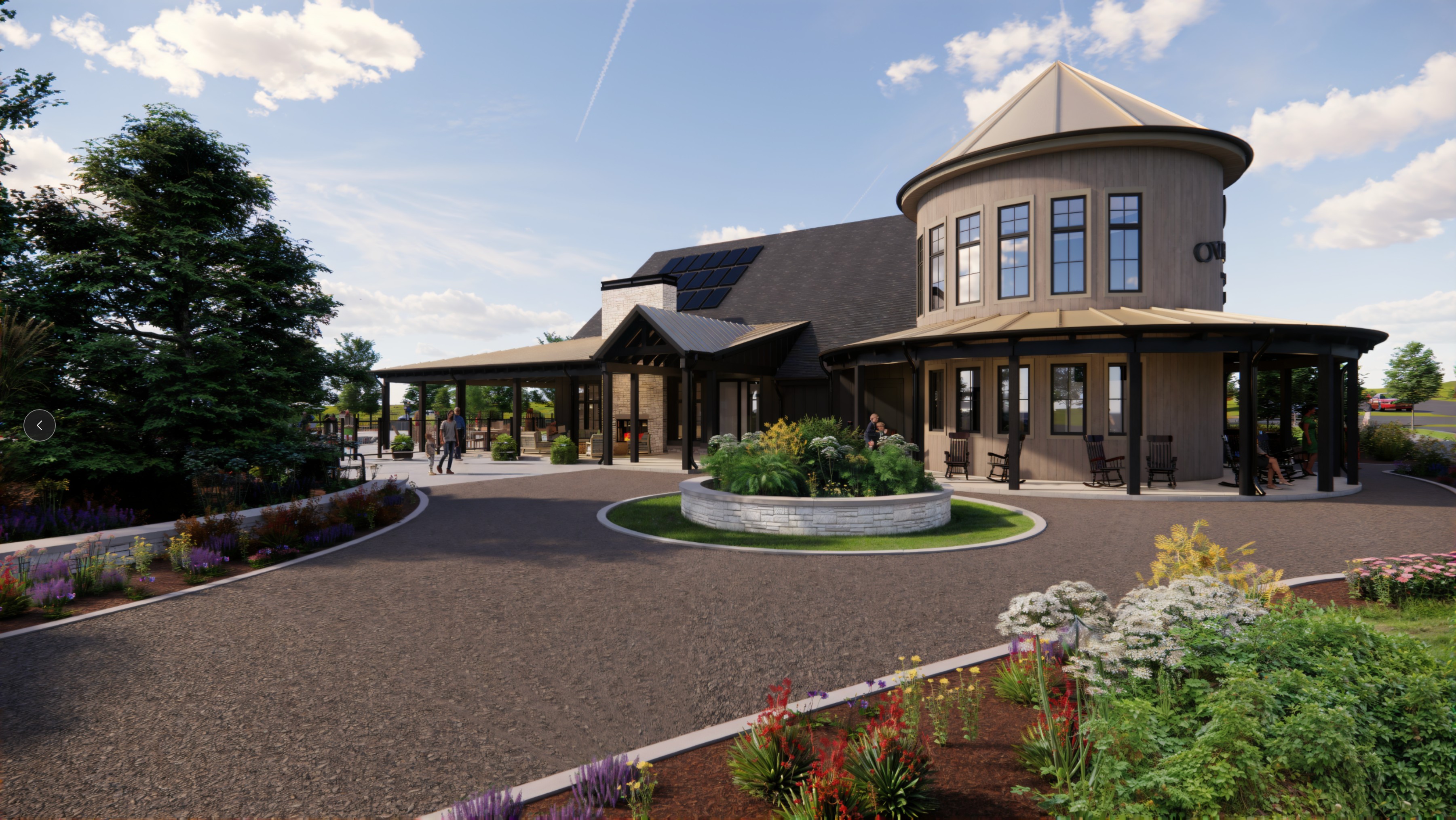 A building with a fountain in front.