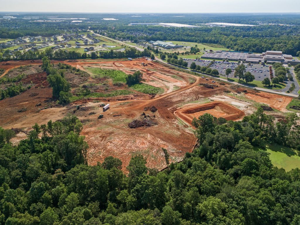 A landscape with trees and buildings.