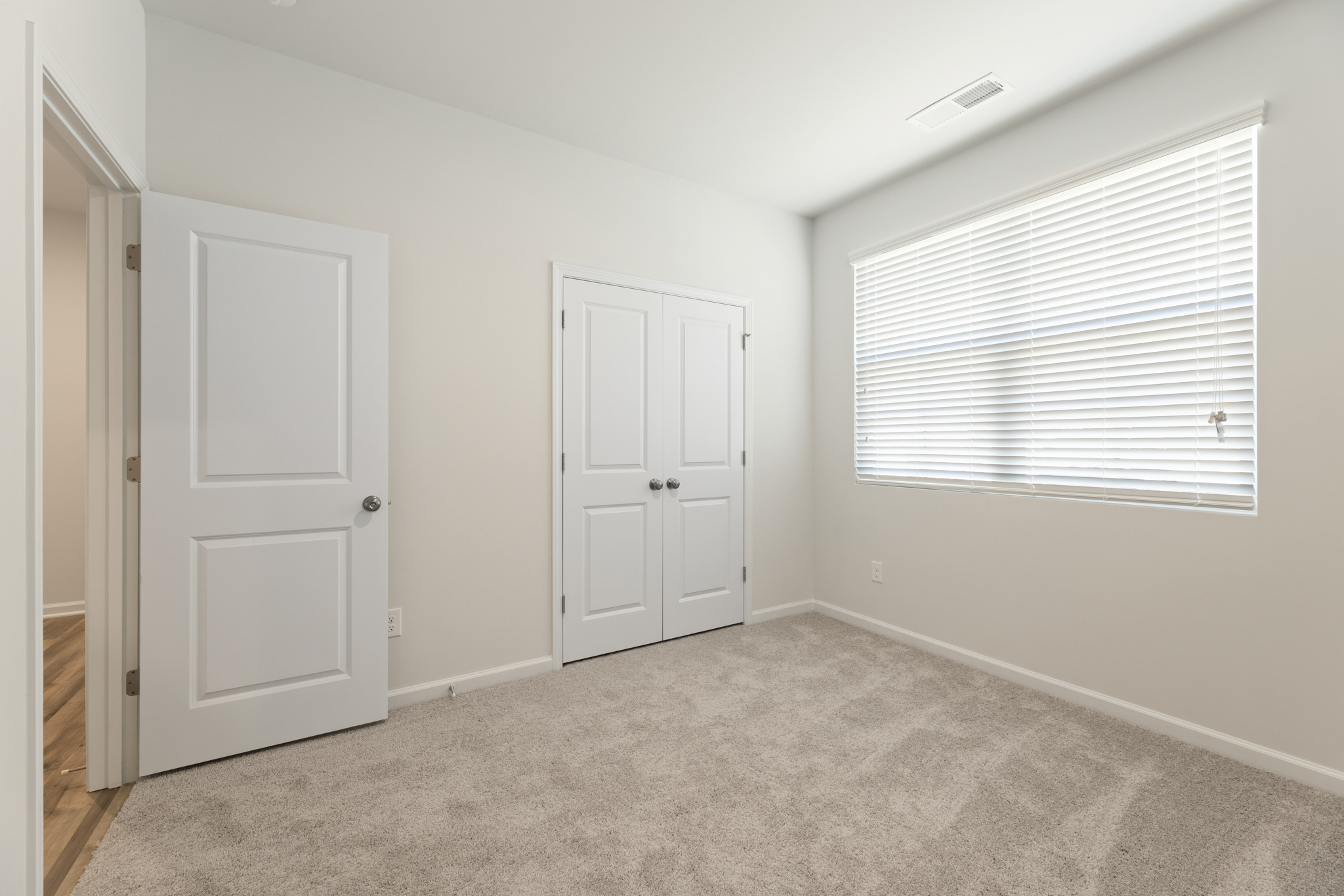 A room with white doors.