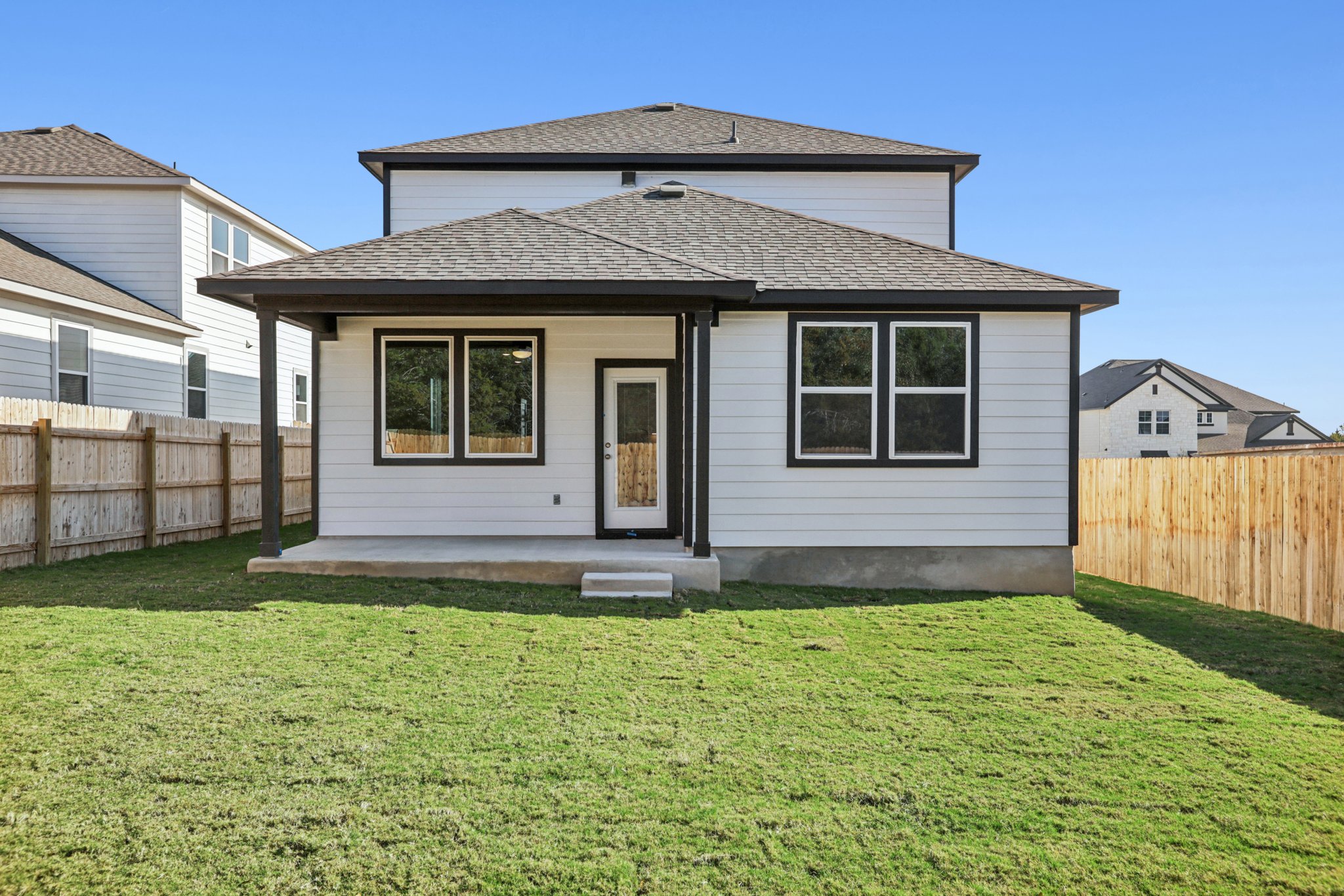 A house with a fence around it.