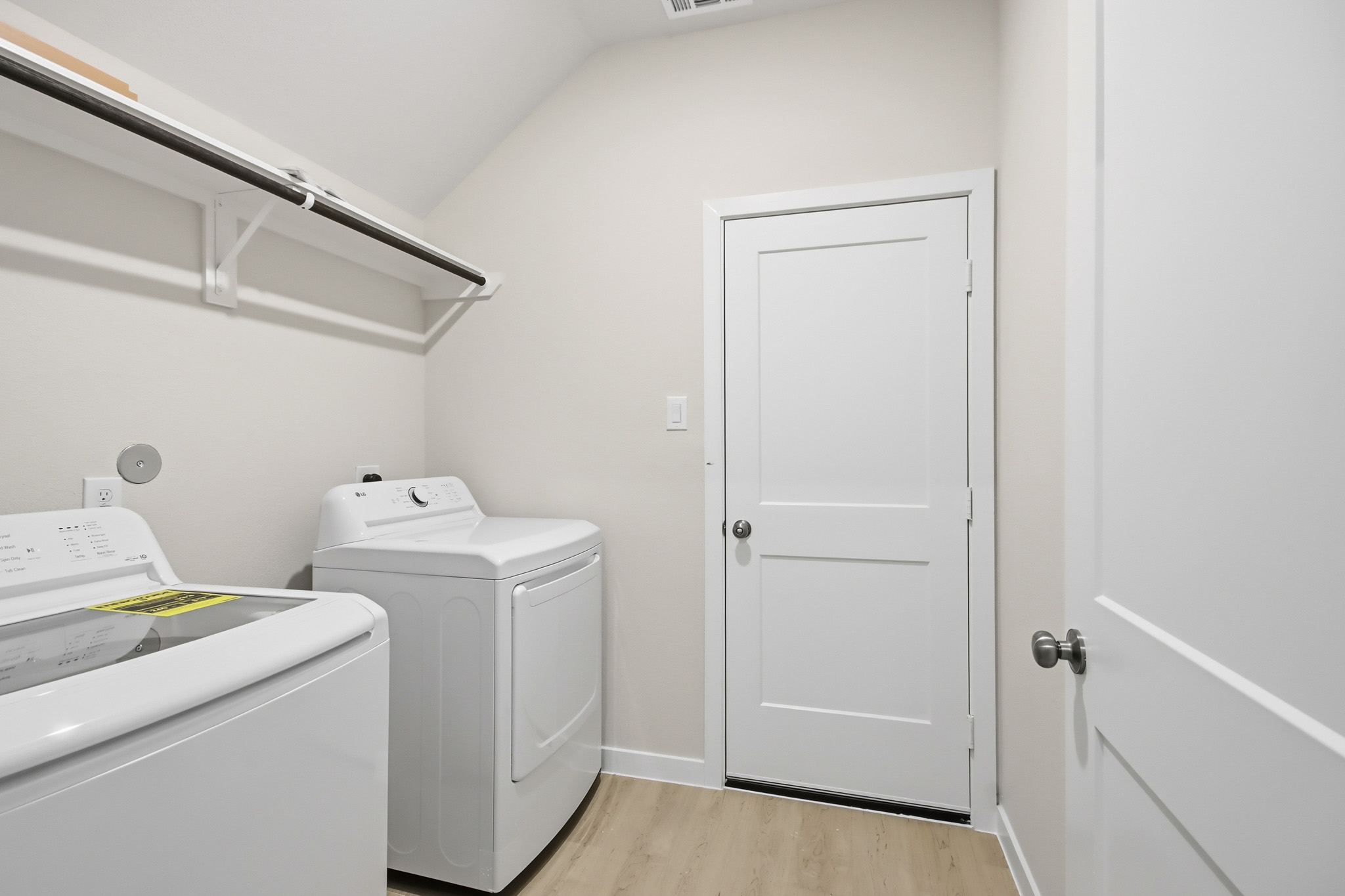 A room with a white door and a white door.