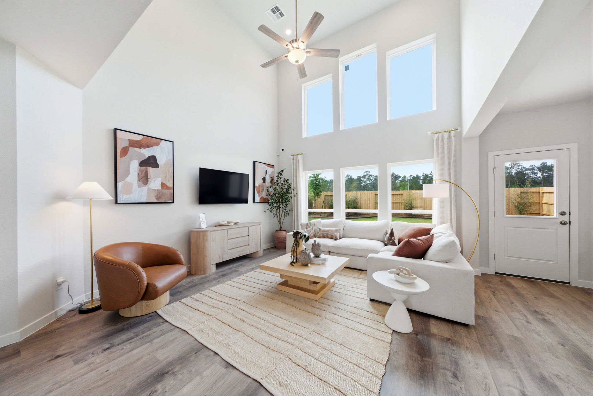 A living room with a large window.