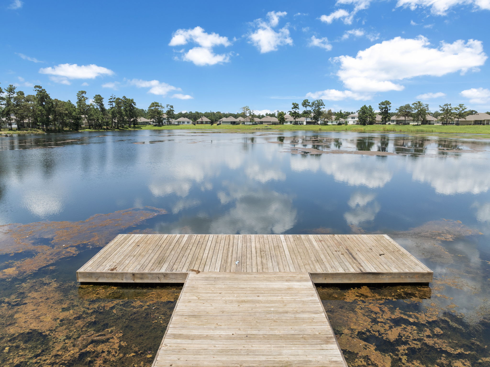 A wooden dock over a body of water.