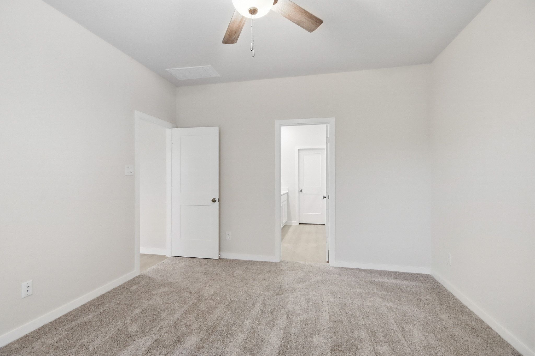 A room with white doors.