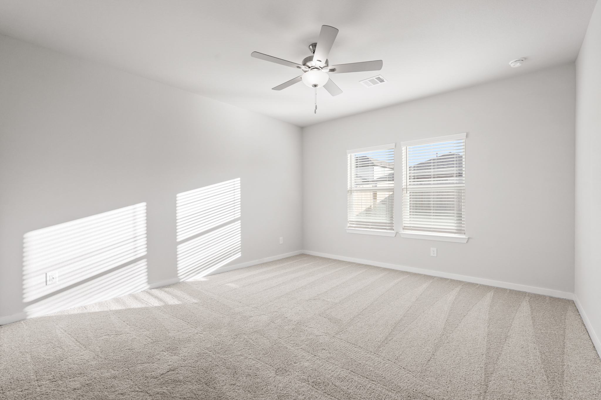 A ceiling fan in a room.