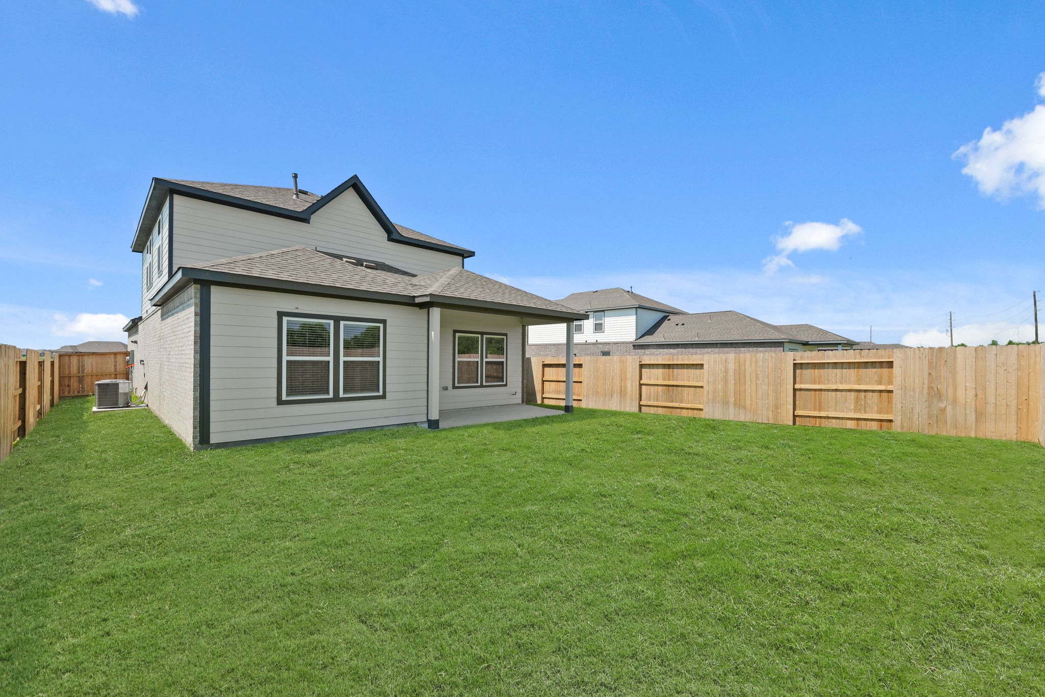 A house with a fence around it.