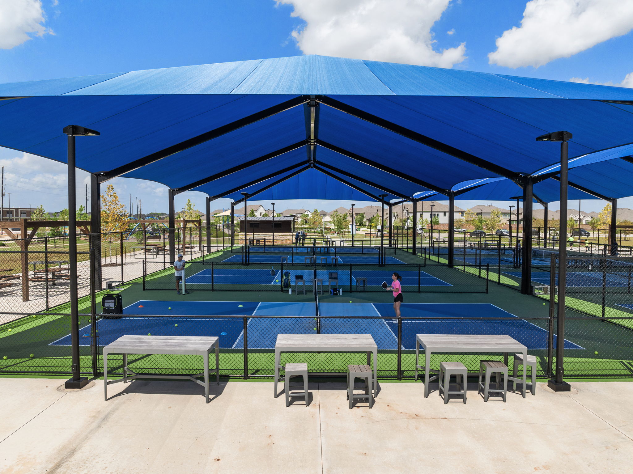 A swimming pool with a covered area.
