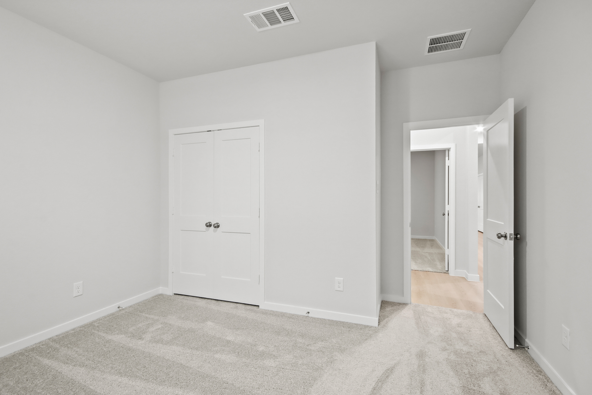 A room with white doors.