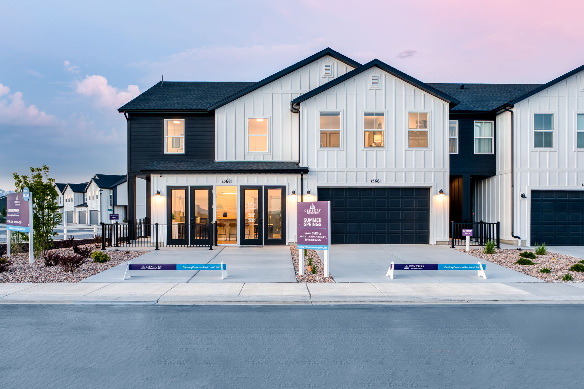 A building with a sign in front.