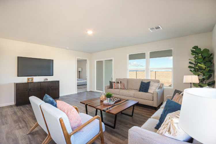 A living room with a tv and couches.