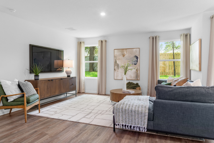 A living room with a large window.