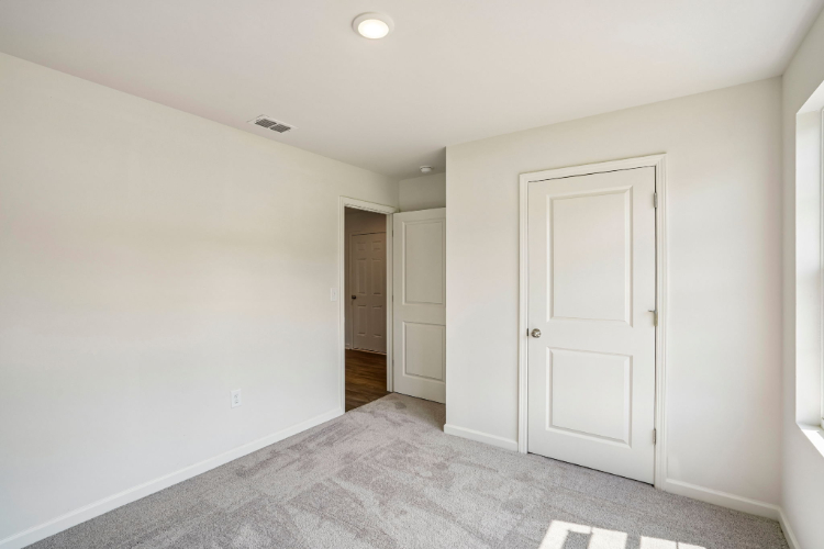 A room with white doors.