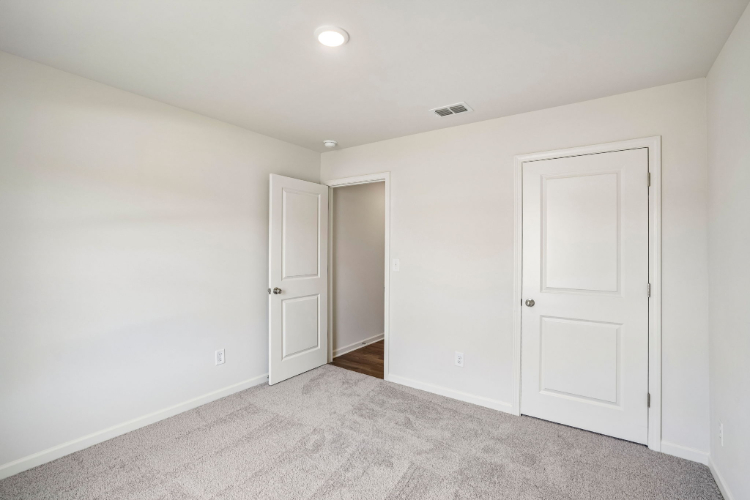 A room with white doors.