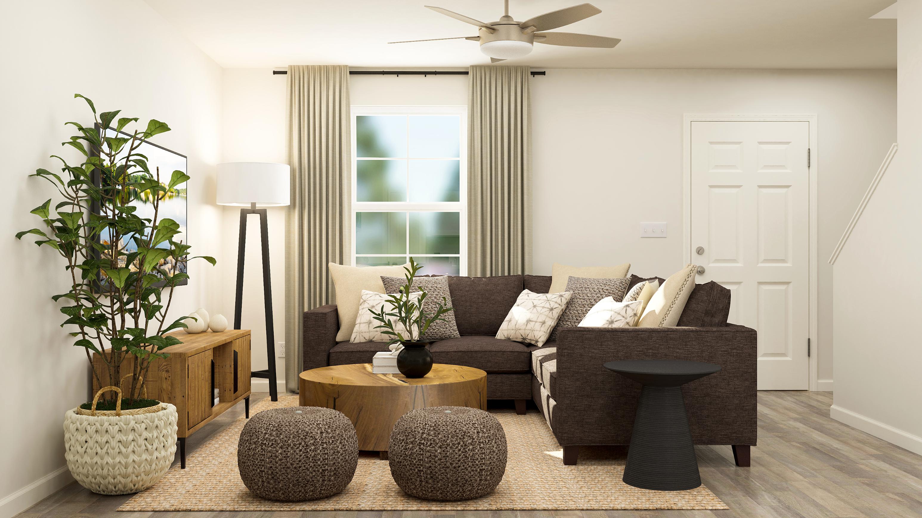 A living room with a couch and a table.