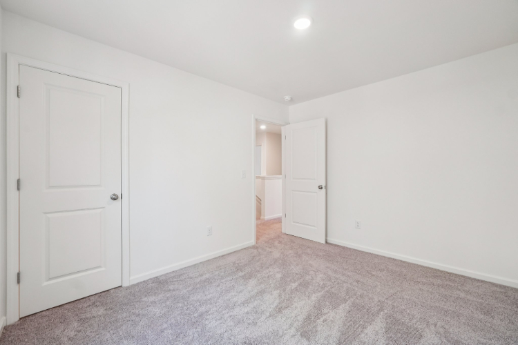 A room with white doors.
